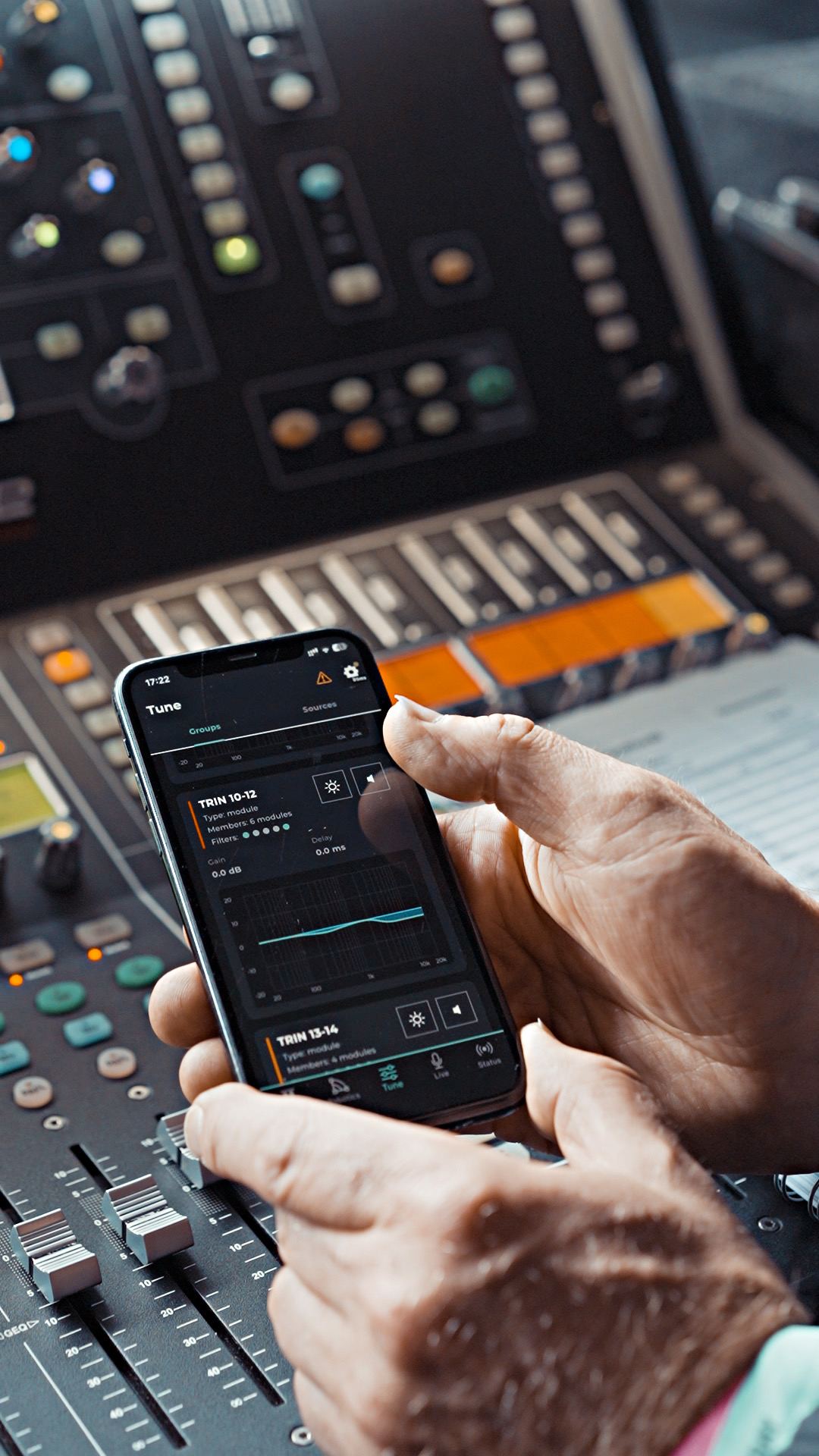 .dynamics MOVE app in hand at front of house